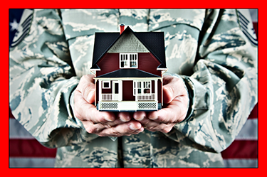 military veteran holding small doll house